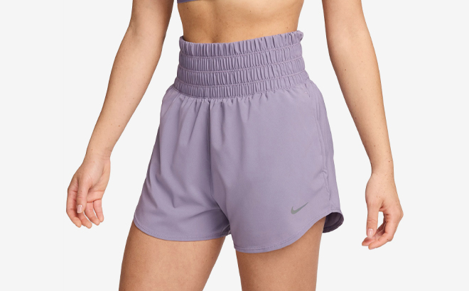 A Person wearing Nike Womens One Dri FIT Ultra High Waisted Shorts