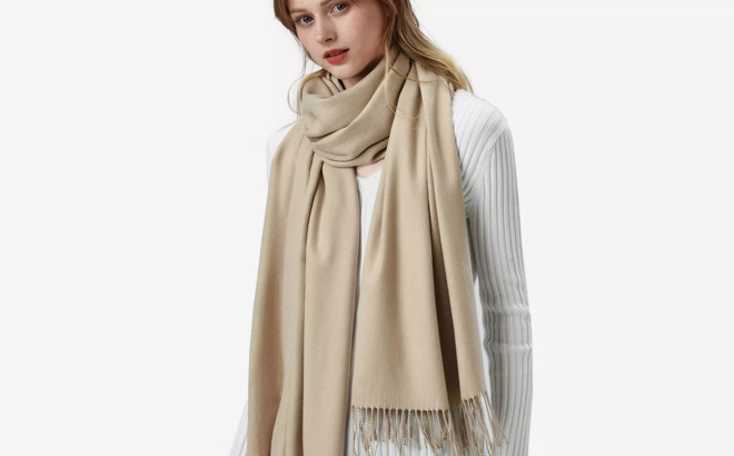 A Person wearing a Cashmere Shawl in Creamy Beige Color