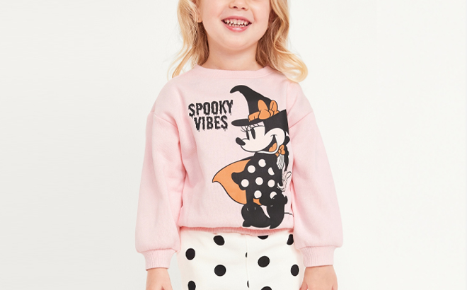 A Person wearing a Disney Toddler Girls Minnie Mouse Sweatshirt