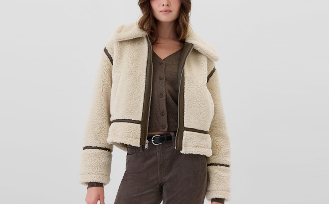 A Person wearing a GAP Factory Relaxed Sherpa Coat