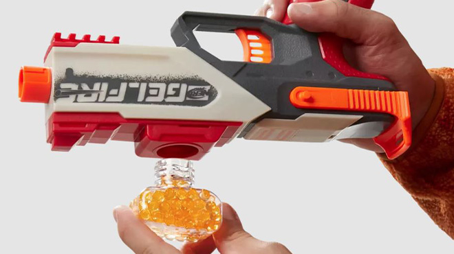 A Teenager Refilling the Nerf Pro Gelfire Legion Spring Action Blaster