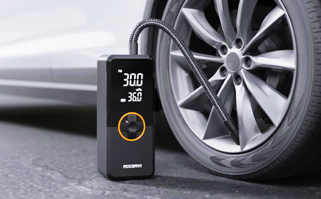 A Tire Inflator Used on a Car