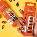 A Woman Holding Sally Hansen Salon Effects Perfect Manicure Reese's Press on Nails Kit