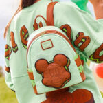 A Woman Wearing Disney Eats Mickey Mouse Ice Cream Sandwich Loungefly Mini Backpack