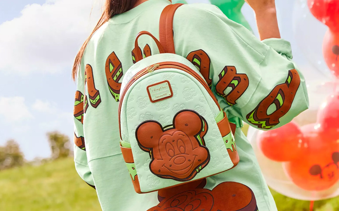 A Woman Wearing Disney Eats Mickey Mouse Ice Cream Sandwich Loungefly Mini Backpack