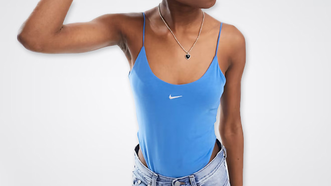 A Woman Wearing Nike Knit Cami Bodysuit