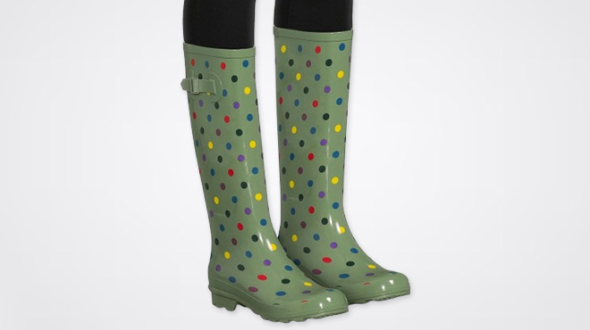 A Woman Wearing Time and Tru Polka Dot Buckle Rain Boots