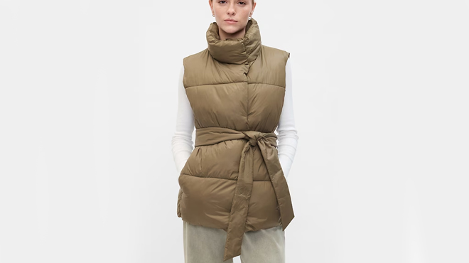 A lady wearing GAP Factory Relaxed Duvet Wrap Puffer Vest