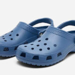 A pair of Bijou Blue Crocs Classic Clog Shoes