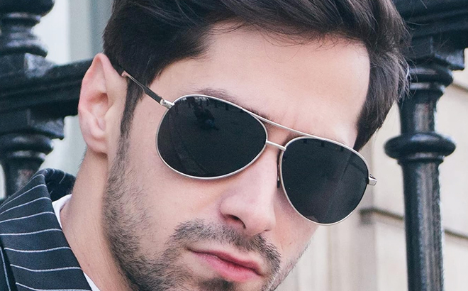 A person wearing a Phikttu Aviator Sunglasses