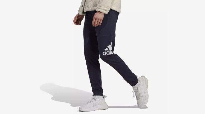 Adidas Mens Essentials Badge of Sport Jersey Tapered Pants in Legend Ink Color