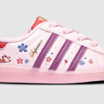 Adidas Originals Superstar El Disney Toddler Girls Shoes on a Grey Background