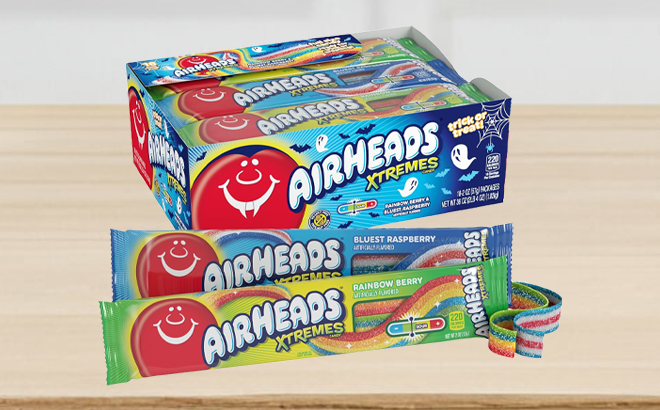 Airheads Xtremes Rainbow Berry and Bluest Raspberry Flavor Candy 18 Count Pack on a Table