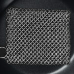 Amagabeli Cast Iron Rectangle Chain Metal Cleanerin a Pan