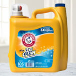 Arm Hammer Fresh Scent Laundry Detergent With OxiClean on a Table