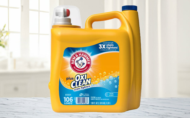 Arm Hammer Fresh Scent Laundry Detergent With OxiClean on a Table