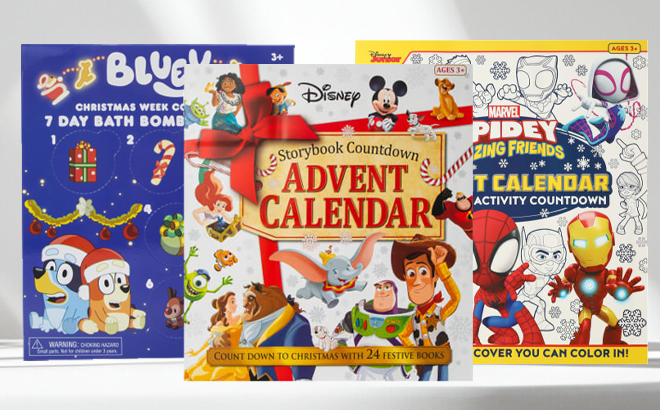 Disney Storybook Countdown Advent Calendar Bluey Christmas Countdown Bath Bomb Calendar and Marvel Coloring Activity Advent Calendar on a Table