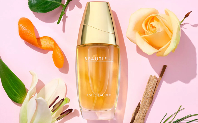 Estee Lauder Beautiful Eau de Parfum Spray Alonside Flowers