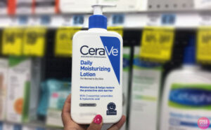 Hand holding CeraVe Moisturizing Face and Body Lotion 2