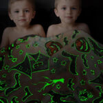 Kids under a Halloween Pumpkin Kids Glow in the Dark Blanket