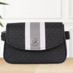 Michael Kors Logo Belt Bag with Stripe on a Table