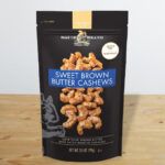 Squirrel Brand Sweet Brown Butter Cashews on a Table