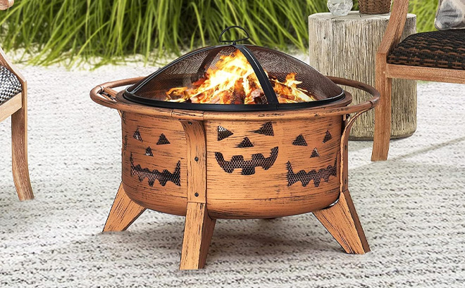 Sunjoy 30 Inch Jack O Lantern Steel Fire Pit