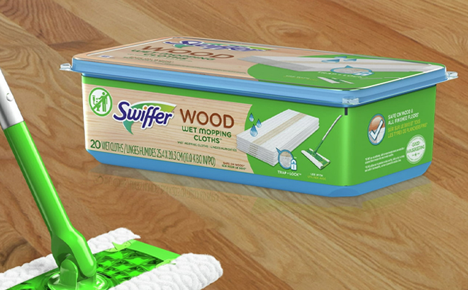 Swiffer Sweeper 20 Count Wood Floor Wet Mopping Cloths Box on a Floor