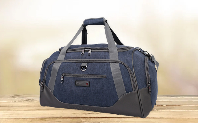 SwissTech Excursion Blue 24 Inch Travel Duffel on a Table