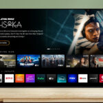 VIZIO 65 Inch Class 4K UHD LED HDR Smart TV on a TV Console