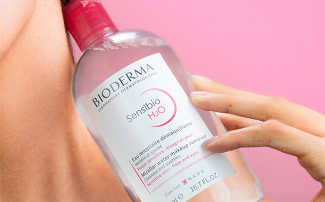 Woman holding Bioderma Sensibio H2O Micellar Water