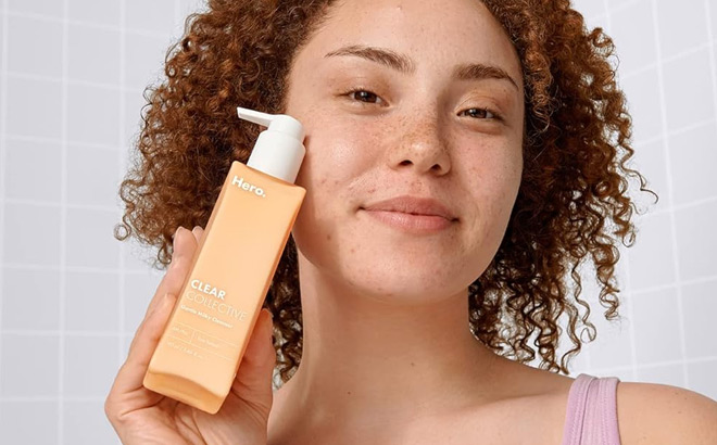 Woman holding Gentle Milky Cleanser