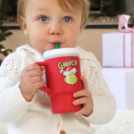 A Child Drinking From an Infantino Grinch My 1st Tumbler