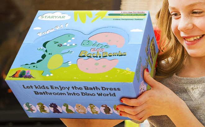 A Child Holding a Box of Dinosaur Bath Bombs