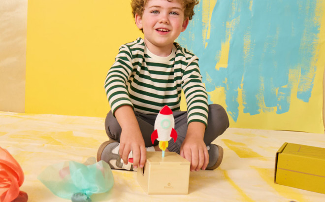 A Child Playing with One of the KiwiCo Sprout Sets