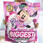 A Girl Holding Disney Junior Minnie Mouse Biggest Blind Bag