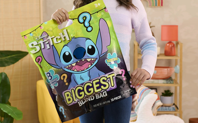 A Girl Holding Disney Stitch Biggest Blind Bag