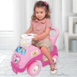 A Girl is Driving the Trademark Global Disney Princess Lights Sounds Ride On Toy