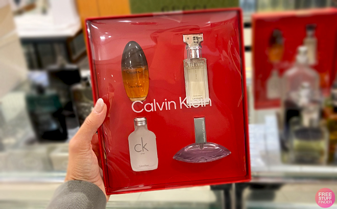 A Hand holding Calvin Klein 4 Piece Fragrance Set