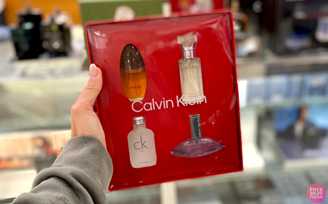 A Hand holding Calvin Klein 4 Piece Fragrance Womens Gift Set