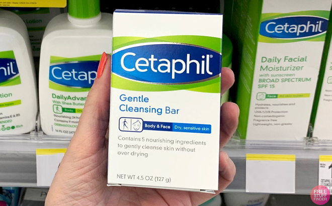 A Hand holding a Cetaphil Gentle Cleansing Bar