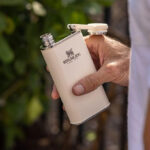 A Man Holding Stanley Legendary Classic Pre Party Liquor and Spirit Flask