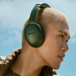 A Man Wearing Bose QuietComfort Bluetooth Wireless Headphones