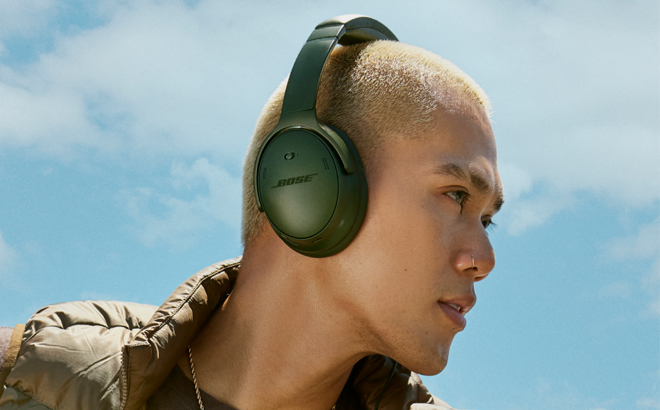 A Man Wearing Bose QuietComfort Bluetooth Wireless Headphones