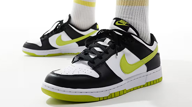 A Man Wearing Nike Dunk Low Retro Sneakers