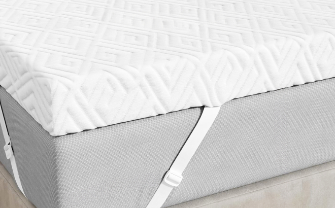 A Memory Foam Mattress Topper Attached on a Bed