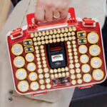 A Person Carrying the Ontel Battery Daddy Smart Battery Organizer Storage Case with Tester