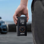 A Person Holding AstroAI L7 Tire Inflator Portable Air Compressor