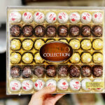 A Person Holding Ferrero Rocher 48 Count Premium Gourmet Assorted Set