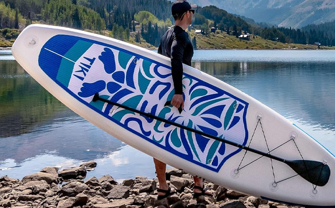 A Person Holding FunWater Inflatable Ultra Light Stand Up Paddle Board